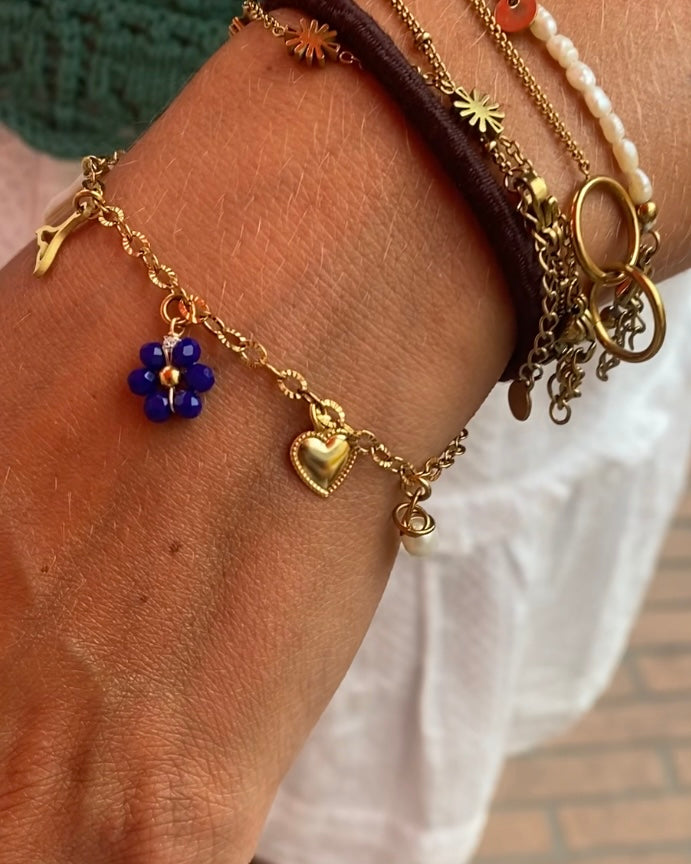 Bracelet personnalisé avec charms en argent, bijou unique sur-mesure pour femme