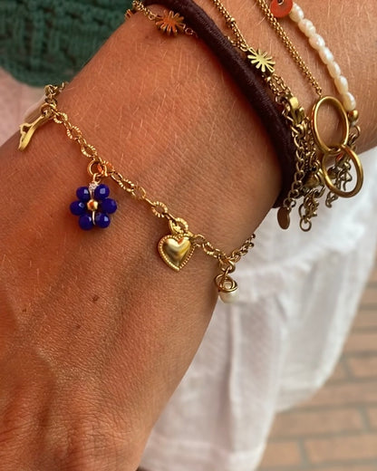 Bracelet personnalisé avec charms en argent, bijou unique sur-mesure pour femme