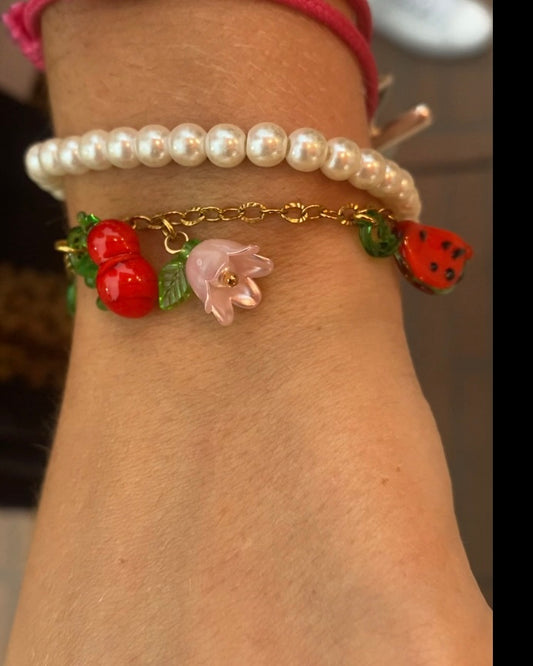 Bracelet personnalisé avec charms en argent, bijou unique sur-mesure pour femme